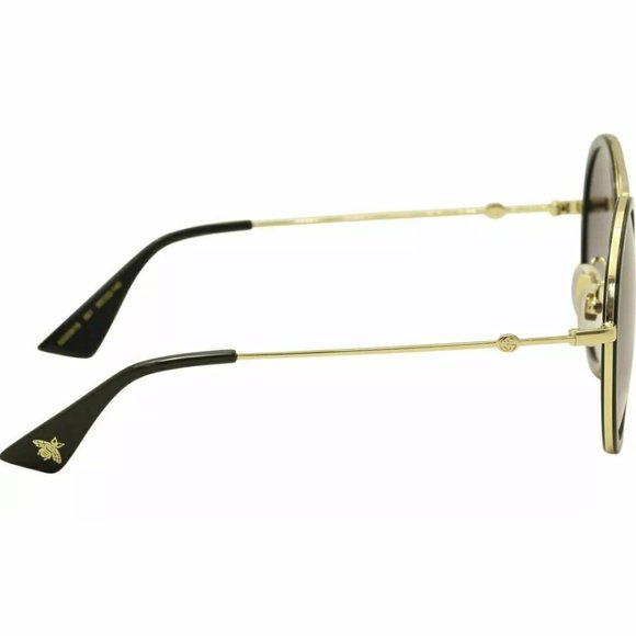 Gucci Women\'s Black and Gold Round Sunglasses!